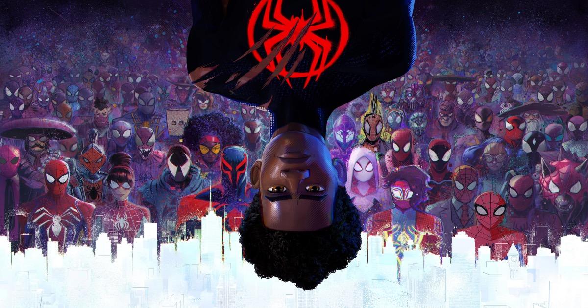 An upside down Miles Morales is in the foreground, with a legion of other spider-people in the background of this Across the Spider-verse promotional image. (One of the spider-people has a bag over their head.)