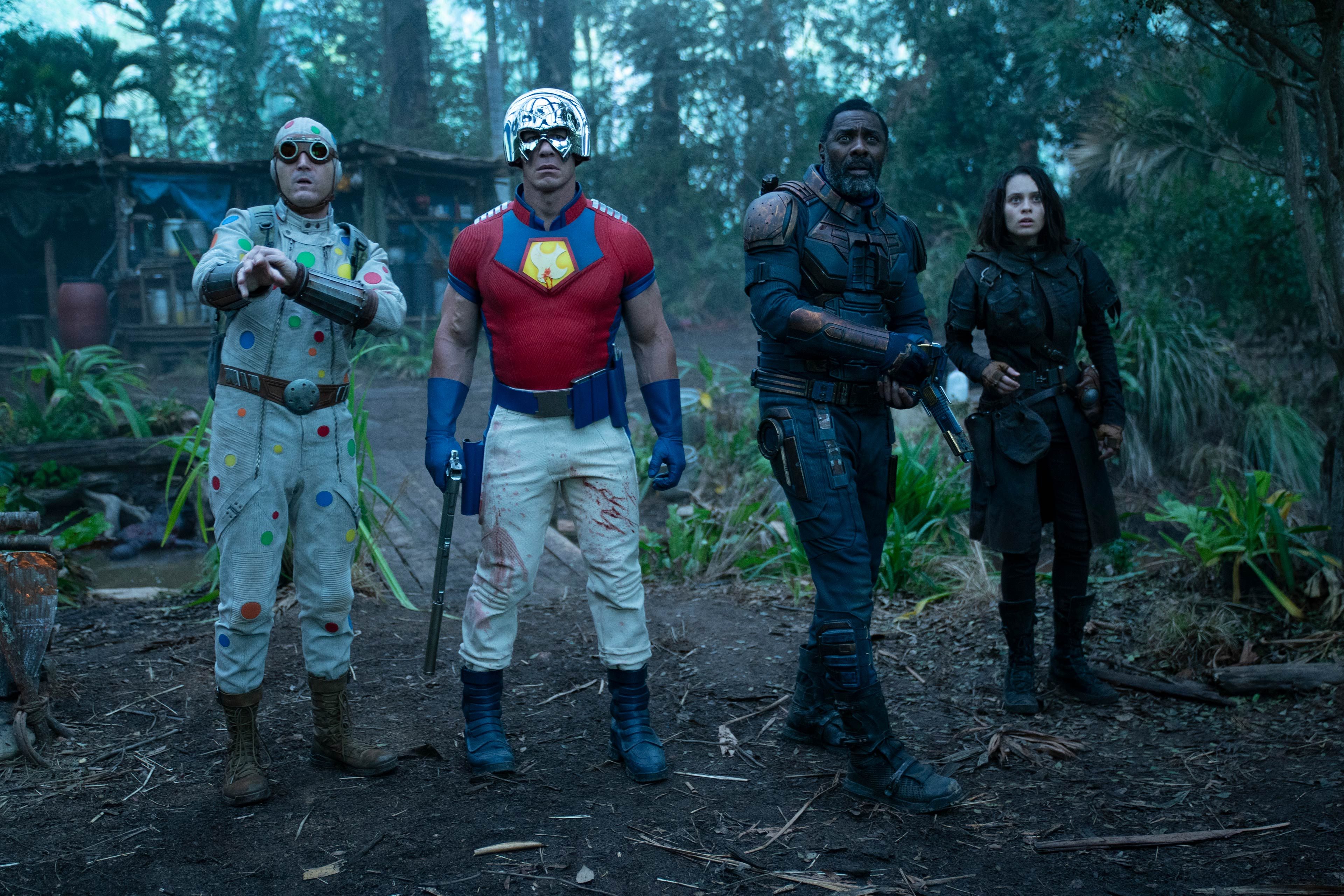 Cena (second from left) originated the role of Peacemaker in The Suicide Squad. (Credit: Warner Brothers)