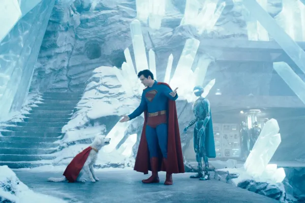 In the icy Fortress of Solitude, Superman -- in full costume -- chastises Krypto, a dog in a cape. A robot stands nearby.