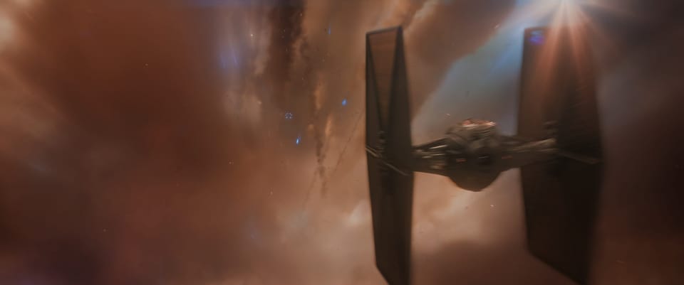 A TIE Fighter tries to fly through a narrow passageway in space in pursuit of another ship.